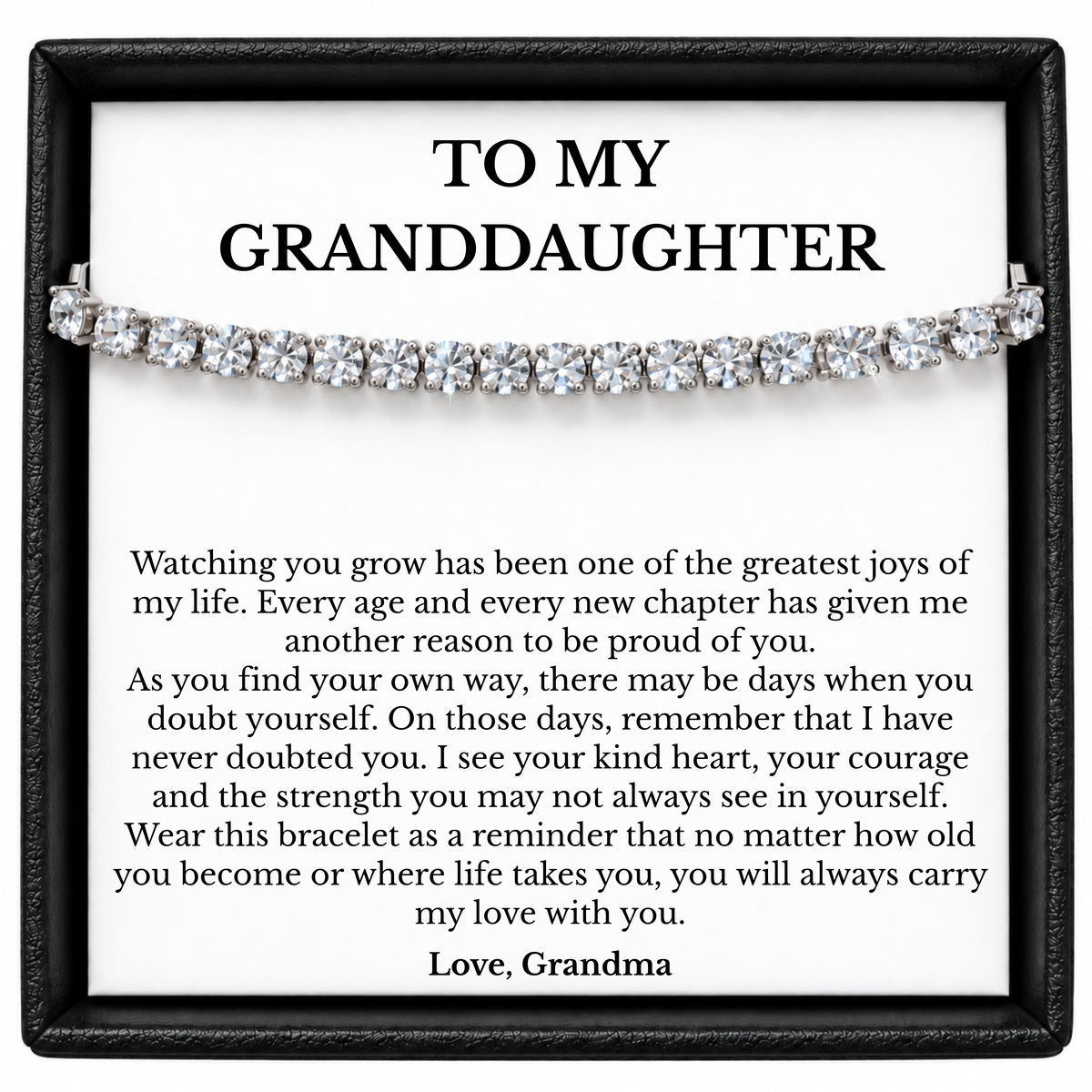 Silver-tone tennis bracelet in a black gift box with a To My Granddaughter message card signed Love, Grandma.