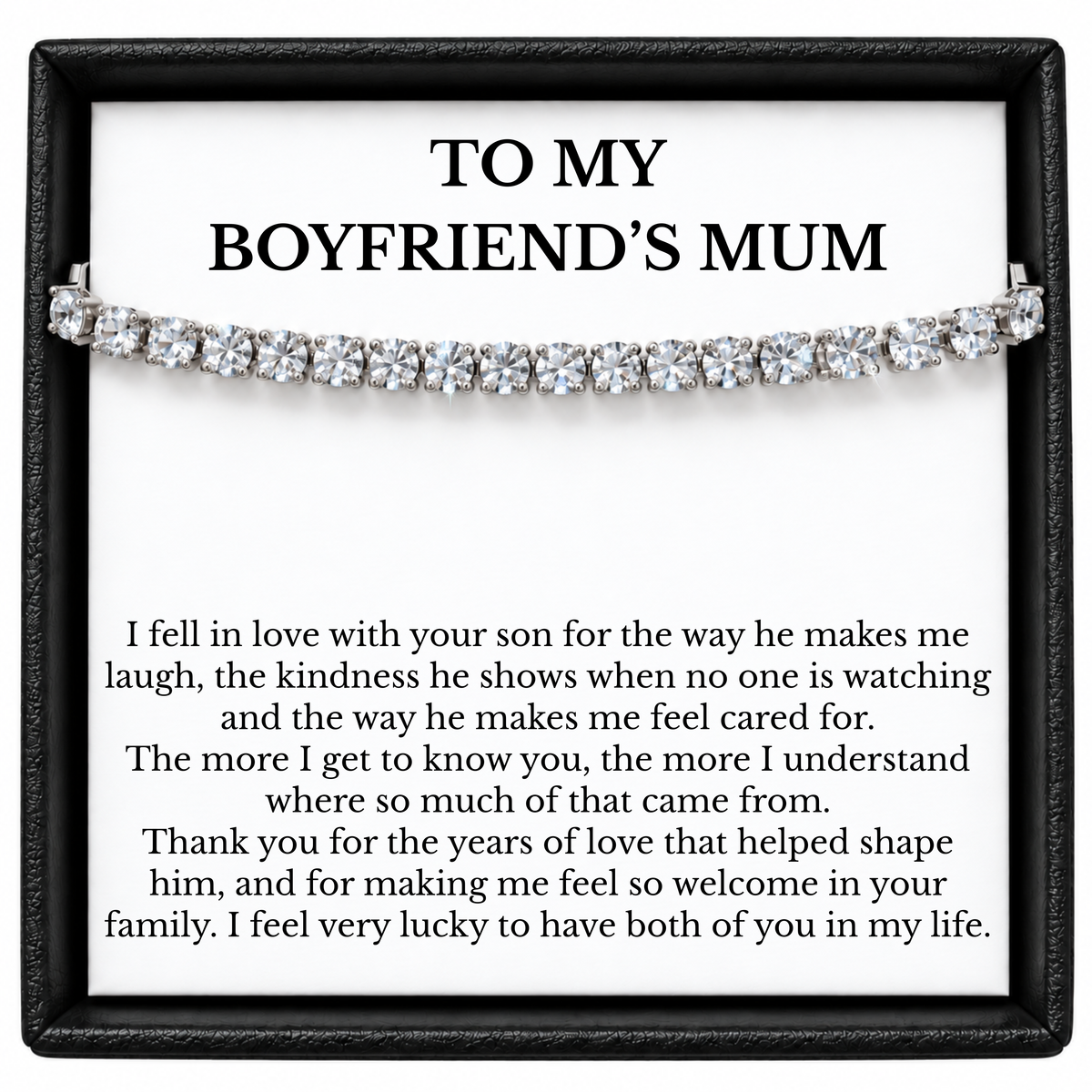 Silver-tone tennis bracelet displayed across a “To My Boyfriend’s Mum” message card in an open black gift box.