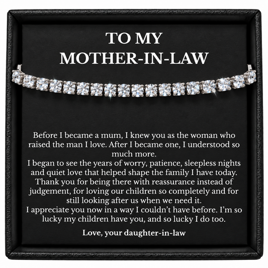 Silver-coloured tennis bracelet in a black gift box with a mother-in-law message card from a daughter-in-law.