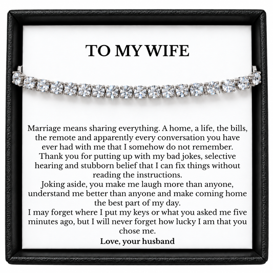 Tennis bracelet in a black gift box with a funny, loving To My Wife message card from her husband.
