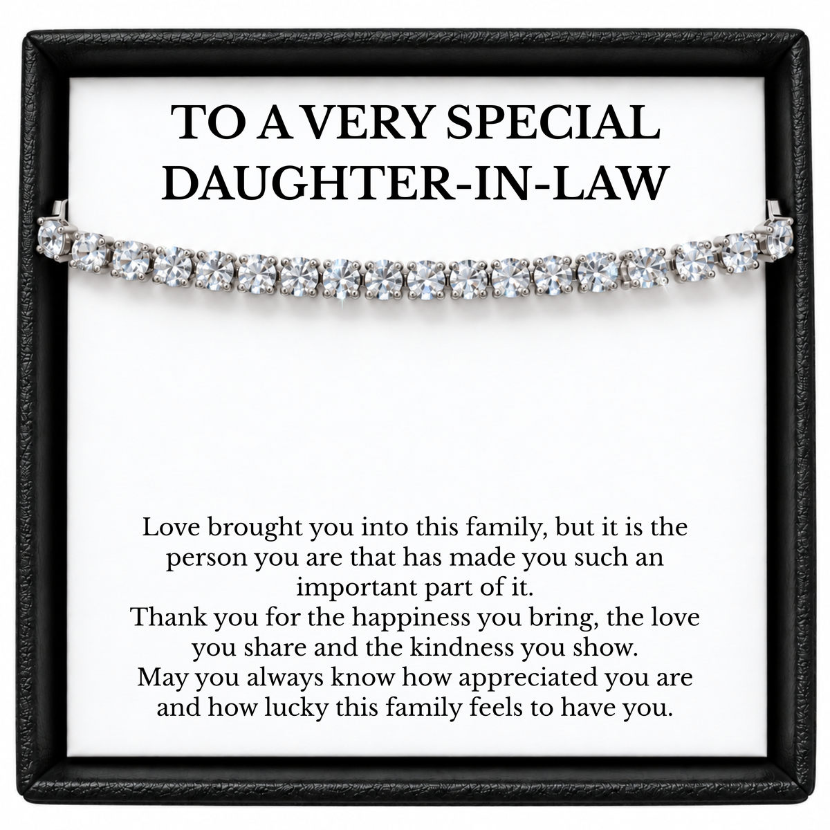 Silver-tone tennis bracelet across a white daughter-in-law message card in a black gift box.