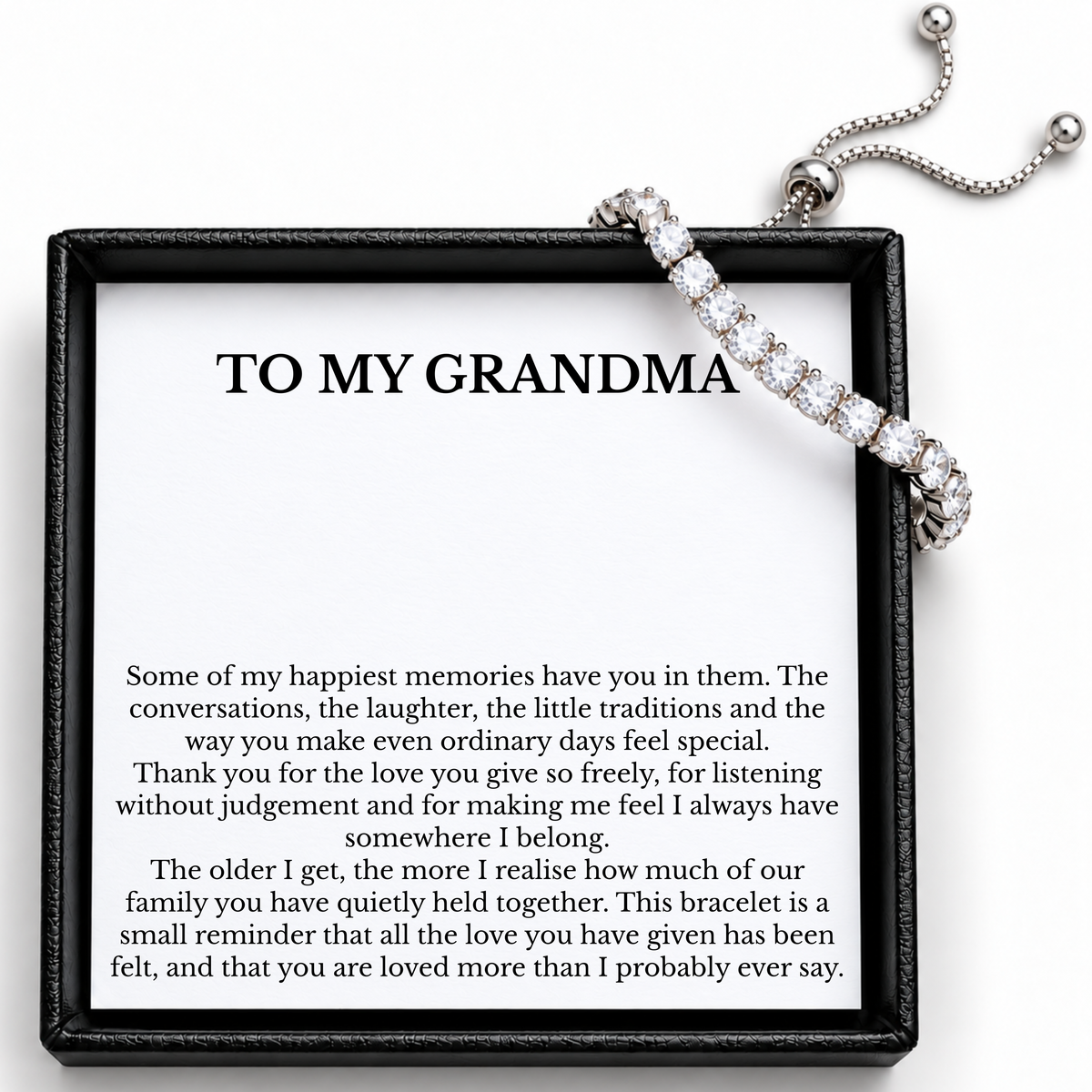Grandma tennis bracelet showing its adjustable slider and bead-ended chains beside the printed message card.