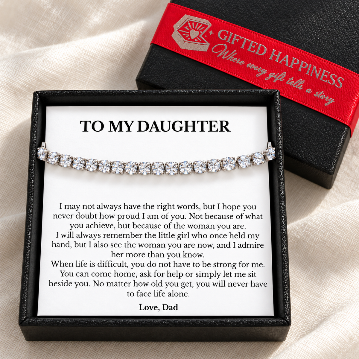 Daughter bracelet gift from Dad with its printed message card and black gift box finished with Gifted Happiness red ribbon.