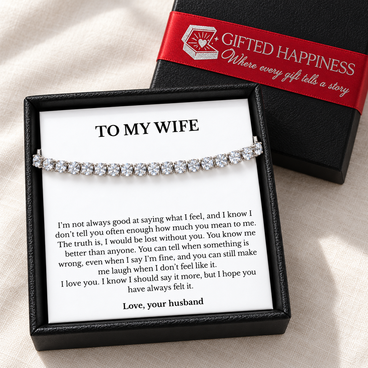 Wife bracelet gift from husband with a printed message card, black gift box and red Gifted Happiness ribbon